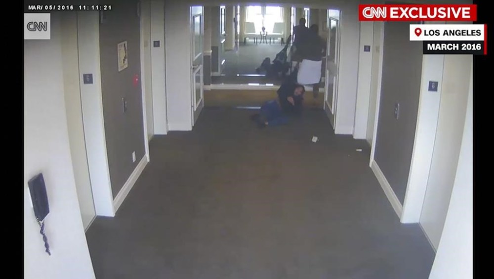 This frame grab taken from hotel security camera video and aired by CNN appears to show Sean “Diddy” Combs attacking singer Cassie in a Los Angeles hotel hallway in March 2016. (Hotel Security Camera Video/CNN via AP)