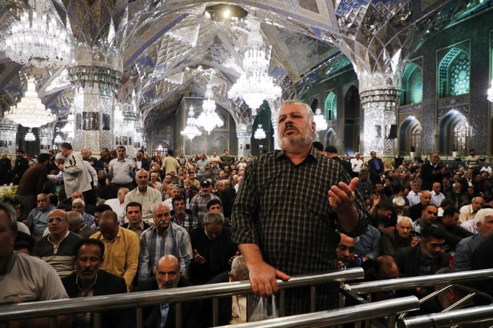Iranian pilgrims pray for President Ebrahim Raisi at Imam Reza Shrine in the city of Mashhad, Sunday, May 19, 2024. A helicopter carrying Iranian President Raisi suffered a