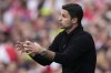 Arsenal's manager Mikel Arteta reacts during the English Premier League soccer match between Arsenal and Everton at the Emirates stadium in London, Sunday, May 19, 2024. (AP Photo/Alastair Grant)
