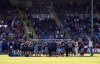 Burnley have a team huddle at the end of the English Premier League soccer match between Burnley and Nottingham Forest, at Turf Moor, in Burnley, England, Sunday, May 19, 2024. (Richard Sellers/PA via AP)