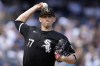 Chicago White Sox pitcher Chris Flexen throws to first base to check on a New York Yankees baserunner during the second inning of a baseball game Sunday, May 19, 2024, in New York. (AP Photo/Adam Hunger)
