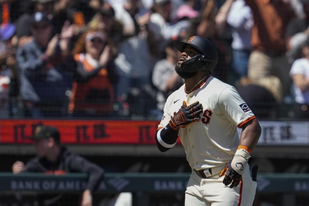 San Francisco Giants' Heliot Ramos runs the bases after hitting a solo home run against the Colorado Rockies during the sixth inning of a baseball game, Sunday, May 19, 2024, in San Francisco. (AP Photo/Godofredo A. Vásquez)