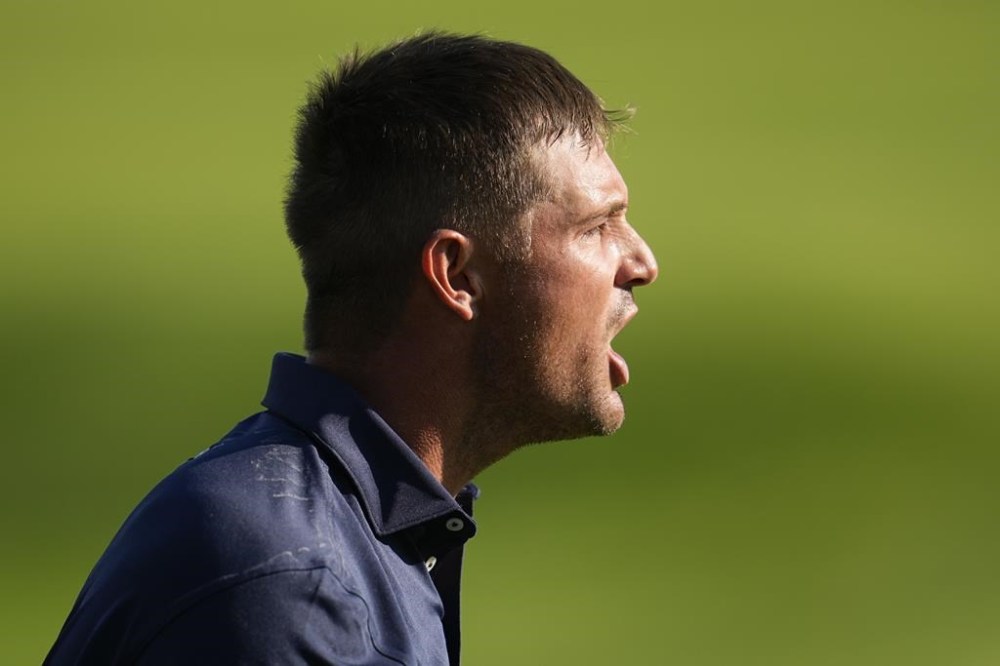 Bryson DeChambeau celebrates after a birdie on the 18th hole during the final round of the PGA Championship golf tournament at the Valhalla Golf Club, Sunday, May 19, 2024, in Louisville, Ky. (AP Photo/Sue Ogrocki)