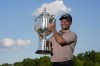 Xander Schauffele holds the Wanamaker trophy after winning the PGA Championship golf tournament at the Valhalla Golf Club, Sunday, May 19, 2024, in Louisville, Ky. (AP Photo/Sue Ogrocki)