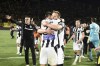 PAOK's players celebrate winning the Greek Super League soccer championship at Kleanthis Vikelidis stadium in the northern port city of Thessaloniki, Greece, Sunday, May 19, 2024. (AP Photo/Giannis Papanikos)