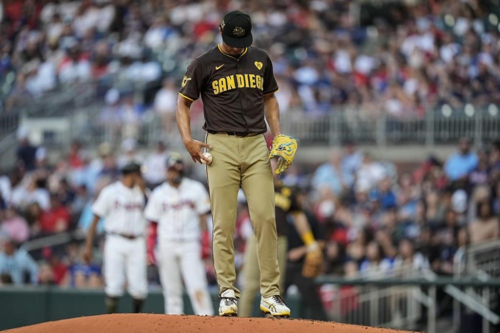 San Diego Padres pitcher Yu Darvish (11) works in the second inning of a baseball game against the Atlanta Braves, Sunday, May 19, 2024, in Atlanta. (AP Photo/Mike Stewart)