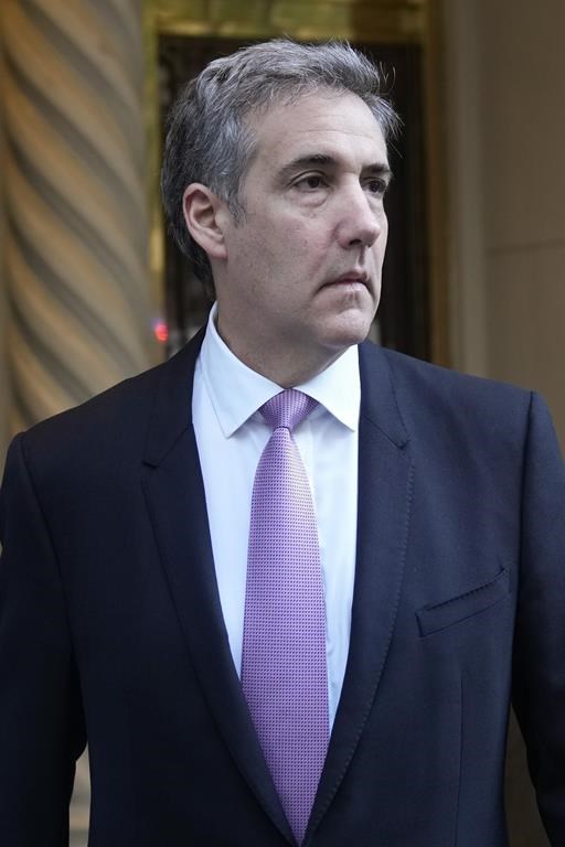 Michael Cohen leaves his apartment building on his way to Manhattan criminal court in New York, Monday, May 20, 2024. (AP Photo/Seth Wenig)