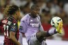 FILE - Monaco's Mohamed Camara, right, and Nice's Alexis Beka Beka challenge for the ball during the League One soccer match between Nice and Monaco at the Allianz Riviera stadium in Nice, Sunday, Sept. 4, 2022. French Sports Minister Amélie Oudéa-Castéra calls for sanctions against AS Monaco's Mohamed Camara after he covers the anti-homophobia logo on his jersey during the final Ligue 1 game Sunday. This incident marks the fourth consecutive year of controversy over the league's anti- discrimination efforts involving rainbow-colored symbols on jerseys. (AP Photo/Daniel Cole, File)