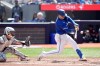 Toronto Blue Jays catcher Danny Jansen (9) hits an RBI double during third inning MLB baseball action against the Chicago White Sox, in Toronto, Monday, May 20, 2024. THE CANADIAN PRESS/Chris Young