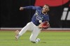 Tampa Bay Rays left fielder Richie Palacios makes a sliding catch on a fly oput by Boston Red Sox' Wilyer Abreu during the eighth inning of a baseball game Monday, May 20, 2024, in St. Petersburg, Fla. (AP Photo/Chris O'Meara)