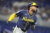 Milwaukee Brewers' Jackson Chourio runs toward first as he flies out during the second inning of a baseball game against the Miami Marlins, Monday, May 20, 2024, in Miami. (AP Photo/Lynne Sladky)