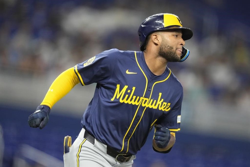 Milwaukee Brewers' Jackson Chourio runs toward first as he flies out during the second inning of a baseball game against the Miami Marlins, Monday, May 20, 2024, in Miami. (AP Photo/Lynne Sladky)