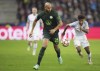FILE - Wolfsburg's John Brooks runs with the ball during the Champions League group G soccer match between Salzburg and VfL Wolfsburg in Salzburg, Austria, on Oct. 20, 2021. United States defender John Brooks is set to leave German Bundesliga club Hoffenheim as a free agent when his contract expires next month. (AP Photo/Matthias Schrader, File)