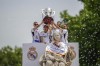 From left, Real Madrid's Toni Kroos, Luka Modric, Nacho and Dani Carvajal celebrate as they hold the Spanish La Liga soccer trophy at the Cibeles Square a week after clinching La Liga title in Madrid, Spain, Sunday, May 12, 2024. (AP Photo/Manu Fernandez)