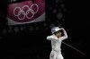 FILE - Ysaora Thibus of France celebrates defeating Arianna Errigo of Italy and won the women's individual Foil semifinal competition at the 2020 Summer Olympics, on July 29, 2021, in Chiba, Japan. Ysaora Thibus, one of France’s leading fencers, says she will be able to compete at the Olympic Games in Paris after escaping a disciplinary sanction from the International fencing federation over an abnormal doping test. Thibus had been provisionally suspended in February. (AP Photo/Hassan Ammar, File)