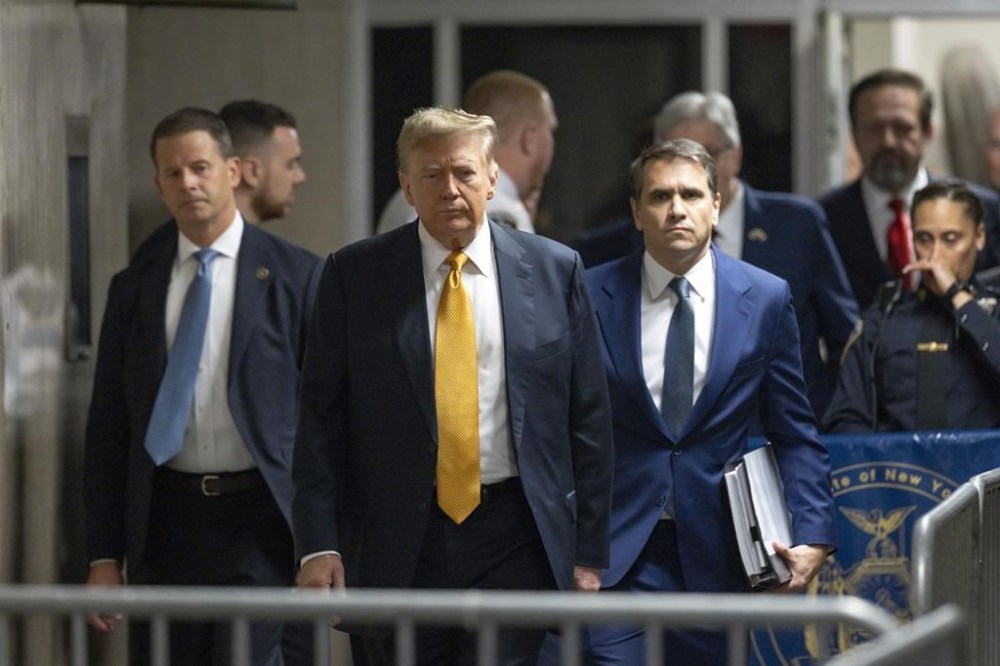 Former President Donald Trump and his attorney Todd Blanche arrive at Manhattan Criminal Court, Tuesday, May 21, 2024, in New York. (Justin Lane/Pool Photo via AP)