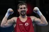 Canada's Wyatt Sanford celebrates after beating Mexico's Miguel Martinez in the men's 63.5kg gold medal bout, at the Pan American Games in Santiago, Chile, Friday, Oct. 27, 2023. Bantamweight Scarlett Delgado leads a team of nine Canadian boxers trying to fight their way into this summer's Paris Olympic field at a last-ditch World Qualification Tournament in Bangkok. Canada has already qualified two boxers for Paris, which features 13 weight classes — seven for men and six for women. THE CANADIAN PRESS/AP/Martin Mejia