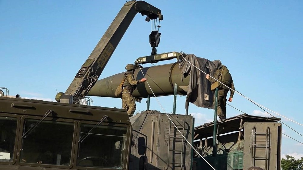 In this photo released by Russian Defense Ministry Press Service on Tuesday, May 21, 2024, Russian troops load an Iskander missile as part of drills to train the military for using tactical nuclear weapons at an undisclosed location in Russia. Russia's Defense Ministry on Tuesday said it began the first round of drills involving tactical nuclear weapons. It was the first time Russia has publicly announced drills involving tactical nuclear weapons, although its strategic nuclear forces regularly hold exercises. (Russian Defense Ministry Press Service via AP)