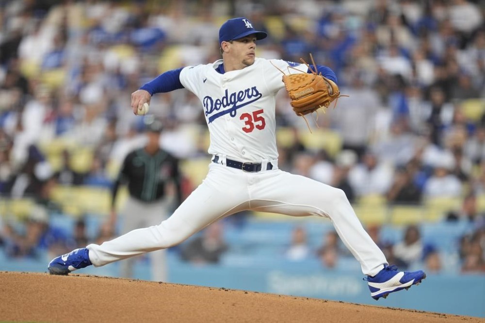 Los Angeles Dodgers starting pitcher Gavin Stone throws to an Arizona Diamondbacks batter during the first inning of a baseball game Tuesday, May 21, 2024, in Los Angeles. (AP Photo/Marcio Jose Sanchez)