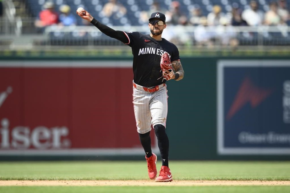 Minnesota Twins shortstop Carlos Correa throws to first to put out Washington Nationals' Nick Senzel during the eighth inning of a baseball game, Wednesday, May 22, 2024, in Washington. The Twins won 3-2. (AP Photo/Nick Wass)