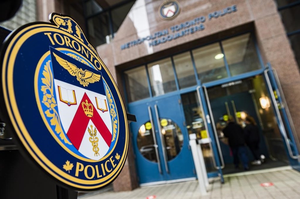 Toronto police say DNA tests helped identify a woman found dead in Lake Ontario in August 2017 by leading investigators to her Swiss relatives, the latest cold case cracked by investigative genetic genealogy. The Toronto Police Services emblem is photographed during a press conference at TPS headquarters, in Toronto, Tuesday, May 17, 2022. THE CANADIAN PRESS/Christopher Katsarov