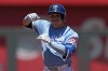 Kansas City Royals' Freddy Fermin celebrates on second after hitting an RBI double during the second inning of a baseball game against the Detroit Tigers Wednesday, May 22, 2024, in Kansas City, Mo. (AP Photo/Charlie Riedel)