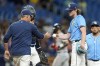 Tampa Bay Rays pitcher Ryan Pepiot, right, hands the ball to manager Kevin Cash as he is taken out of the game against the Boston Red Sox during the fifth inning of a baseball game Wednesday, May 22, 2024, in St. Petersburg, Fla. (AP Photo/Chris O'Meara)
