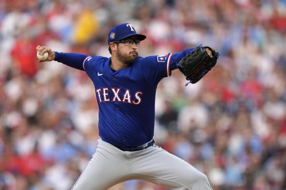 Texas Rangers' Dane Dunning pitches during the second inning of a baseball game against the Philadelphia Phillies, Wednesday, May 22, 2024, in Philadelphia. (AP Photo/Matt Slocum)