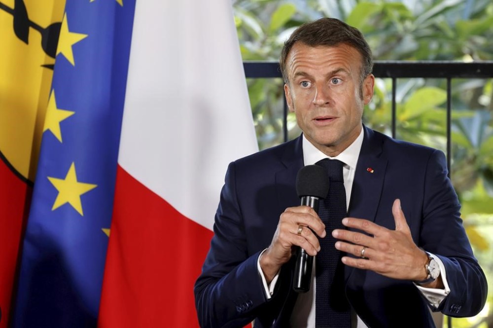French President Emmanuel Macron speaks during a meeting with New Caledonia's elected officials at the French High Commissioner Louis Le Franc's residence in Noumea, New Caledonia, Thursday, May 23, 2024. Macron has landed in riot-hit New Caledonia, having crossed the globe by plane from Paris in a high-profile show of support for the French Pacific archipelago wracked by deadly unrest and where indigenous people have long sought independence from France. (Ludovic Marin/Pool Photo via AP)