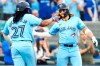 Toronto Blue Jays' Bo Bichette, right, celebrates his two-run home run against the Chicago White Sox with Vladimir Guerrero Jr. (27) during second inning MLB baseball action in Toronto on Wednesday, May 22, 2024. THE CANADIAN PRESS/Frank Gunn