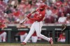 Cincinnati Reds' Jeimer Candelario hits a home run against the San Diego Padres during the first inning of a baseball game Wednesday, May 22, 2024, in Cincinnati. (AP Photo/Carolyn Kaster)