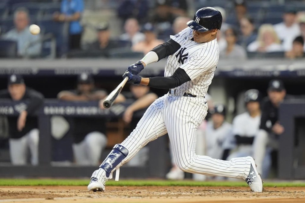 New York Yankees' Juan Soto hits a two-run home run against the Seattle Mariners during the third inning of a baseball game Wednesday, May 22, 2024, in New York. (AP Photo/Frank Franklin II)