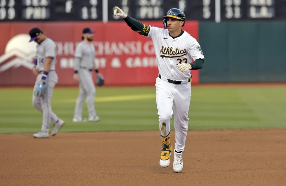 Oakland Athletics' JJ Bleday gestures while running the bases on a solo home run againt the Colorado Rockies during the fourth inning of a baseball game Wednesday May 22, 2024, in San Francisco Chronicle. (Carlos Avila Gonzalez/San Francisco Chronicle via AP)