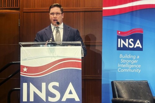 John Beieler, chief AI officer at the Office of the Director of National Intelligence, speaks at a conference of the Intelligence and National Security Alliance on Thursday, April 4 , 2024, in Arlington, Virginia. U.S. intelligence agencies are scrambling to embrace the AI revolution, believing they'll otherwise be smothered by exponential data growth as sensor-generated surveillance tech further blankets the planet. (AP Photo/Frank Bajak)