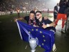 The players of Bologna celebrate their admission to the Champions League for next season after Bologna and Juventus ended up drawing 3-3 at the Dall'Ara stadium, in Bologna, Italy, Monday, May 20, 2024. (Michele Nucci/LaPresse via AP)