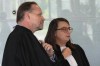 Gilles Moreu, left, and Lola Chunet, lawyers for Maradona's daughters Dalma and Gianinna, discuss before a court hearing, Thursday, May 23, 2024 in Nanterre, outside Paris. Diego Maradona's heirs filed a lawsuit to try to stop the auction of a trophy he was awarded after the 1986 World Cup won by Argentina. (AP Photo/Michel Euler)