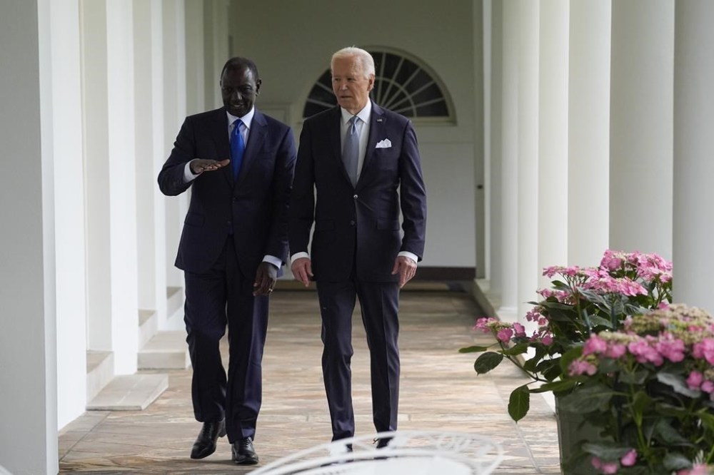 President Joe Biden and Kenya's President William Ruto walk along the Colonnade around the Rose Garden on their way to the Oval Office for a meeting after a State Arrival Ceremony at the White House, Thursday, May 23, 2024, in Washington. (AP Photo/Evan Vucci, Pool)