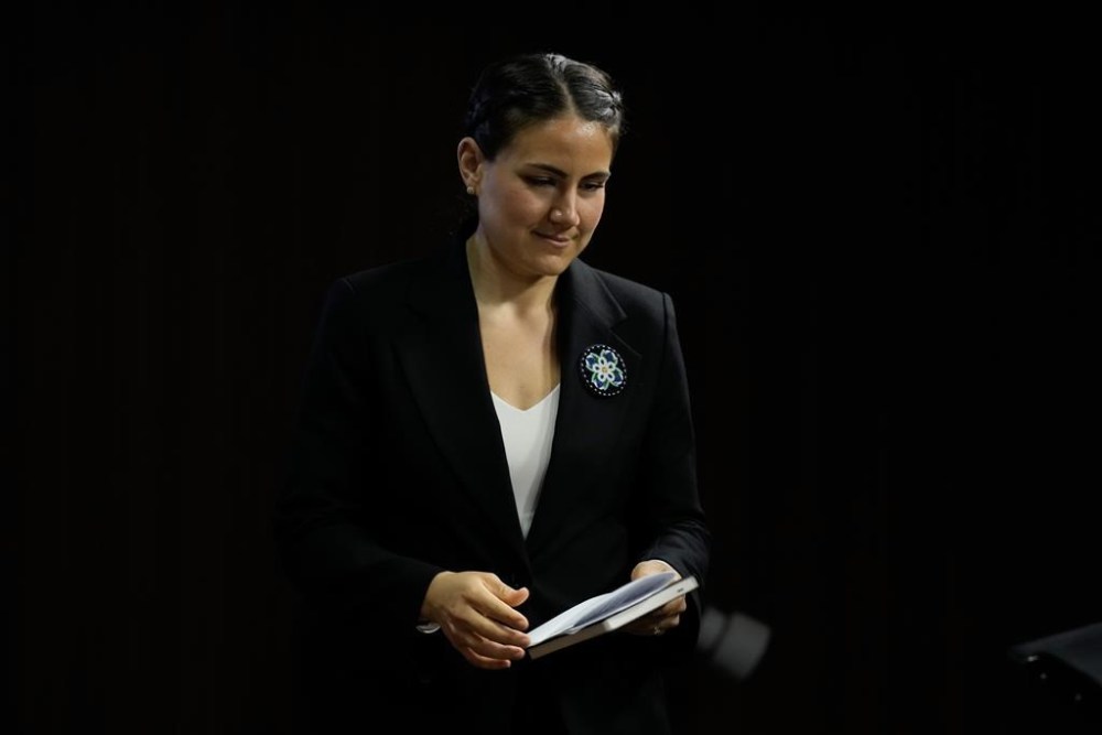 Metis National Council President Cassidy Caron steps up to the podium, Thursday, May 23, 2024 in Ottawa. Caron announced she would not seek re-election. THE CANADIAN PRESS/Adrian Wyld