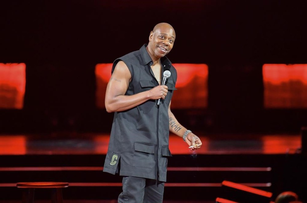 FILE - Comedian Dave Chappelle performs at Madison Square Garden during his 50th birthday celebration week on Tuesday, Aug. 22, 2023, in New York. American comedian Dave Chappelle called the Israeli war on Hamas in the Gaza Strip a