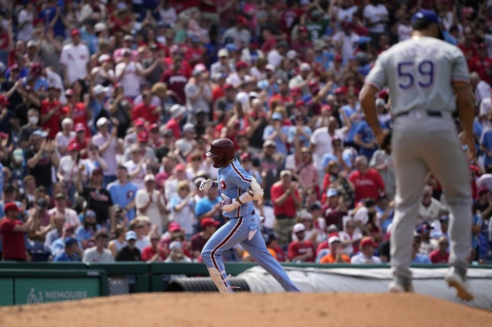 Philadelphia Phillies' Nick Castellanos rounds the bases after hitting a home run against Texas Rangers' Jesus Tinoco during the seventh inning of a baseball game, Thursday, May 23, 2024, in Philadelphia. (AP Photo/Matt Slocum)