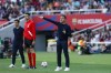 Barcelona's head coach Xavi Hernandez, center, gives instructions during a Spanish La Liga soccer match between Barcelona and Rayo Vallecano at the Olimpic Lluis Companys stadium in Barcelona, Spain, Sunday, May 19, 2024. (AP Photo/Joan Monfort)