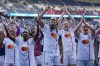 Lyon players celebrate with the fans at the end of the women's Champions League semifinal, second leg, soccer match between Paris Saint-Germain and Olympique Lyonnais at Parc des Princes, in Paris, Sunday, April 28, 2024. Lyon won 2-1 to advance to the final. (AP Photo/Thibault Camus)