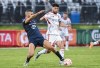 CS Saint-Laurent's Oussama Boughanmi, left, challenges Toronto FC's Jonathan Osorio (21) during first half Canadian Championship quarterfinal soccer action in Montreal, Wednesday, May 8, 2024. THE CANADIAN PRESS/Graham Hughes