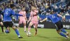 Inter Miami's Lionel Messi (10) pushes forward as CF Montreal's Fernando Alvarez (4) and Samuel Piette (6) defend during first half MLS soccer action against CF Montreal in Montreal, Saturday, May 11, 2024. THE CANADIAN PRESS/Graham Hughes