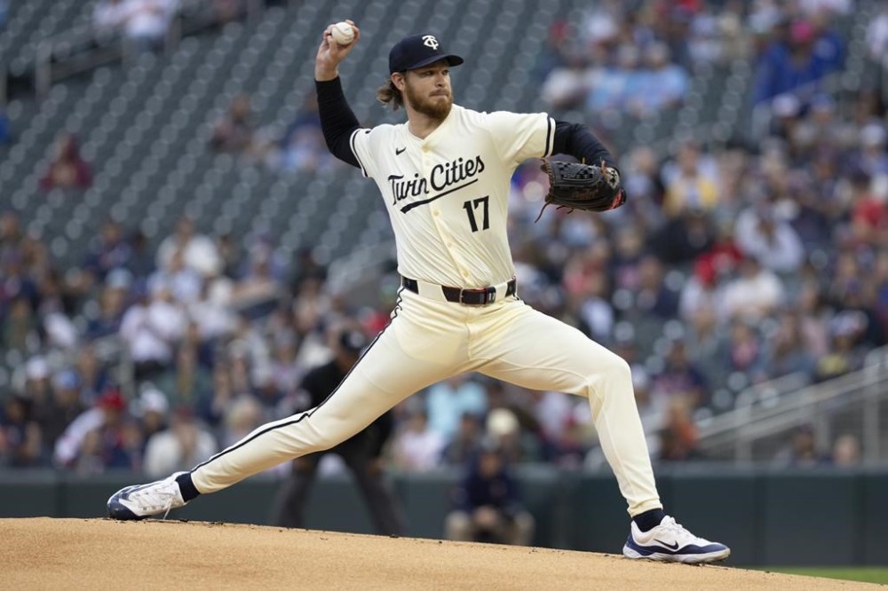 Minnesota Twins pitcher Bailey Ober delivers during the first inning of the team's baseball game against the Texas Rangers, Friday, May 24, 2024, in Minneapolis. (AP Photo/Bailey Hillesheim)