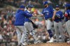 Toronto Blue Jays manager John Schneider, left, takes the ball from pitcher Alek Manoah in the fifth inning of a baseball game against the Detroit Tigers, Friday, May 24, 2024, in Detroit. (AP Photo/Paul Sancya)