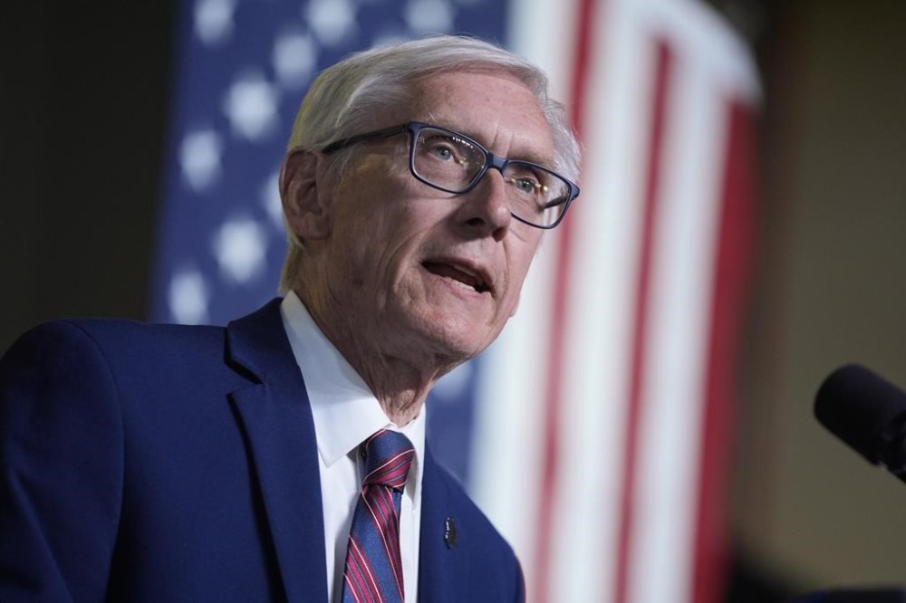 FILE - Wisconsin Gov. Tony Evers speaks before President Joe Biden delivers remarks on his