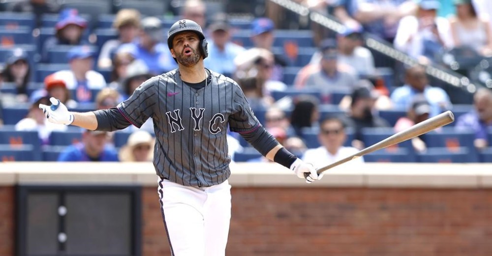 New York Mets' J.D. Martinez reacts after being called out on strikes during the sixth inning of a baseball game against the San Francisco Giants, Saturday, May 25, 2024, in New York. (AP Photo/Noah K. Murray)
