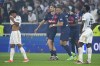 PSG's Kylian Mbappe, center, celebrates with teammates after the French Cup final soccer match between Lyon and PSG at the Pierre Mauroy stadium in Villeneuve d'Ascq, northern France, Saturday, May 25, 2024. PSG won the match 2-1. (AP Photo/Michel Euler)
