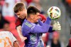 Toronto FC's Sigurd Rosted (back) collides with FC Cincinnati goalkeeper Roman Celentano during first half MLS soccer action in Toronto on Saturday, May 25, 2024. THE CANADIAN PRESS/Frank Gunn